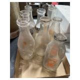 8 Embossed Glass Milk Bottles
