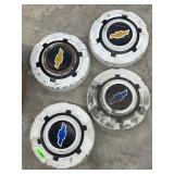 Chevrolet Hubcaps Lot With Blue And Gold Emblems