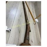 Old gun stock with barrel.