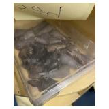 CASE WITH ASSORTED METAL FIGURINES
