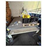 WORK TABLE ON GIANT CASTORS WITH STAINLESS STEEL R