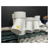 ASSORTED PLUMBING ITEMS - PVC CONNECTORS, CLAMPS,