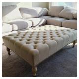 UPHOLSTERED OTTOMAN W/ WHEELS