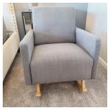 UPHOLSTERED ROCKER