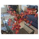 faux red orchid in white bowl