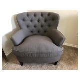 GREY UPHOLSTERED ARMCHAIR