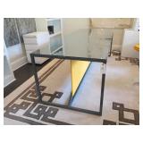 METAL TABLE W/GLASS TOP AND YELLOW PANEL
