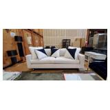 WHITE SOFA W/NAVY PILLOWS
