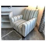 UPHOLSTERED ARM CHAIR