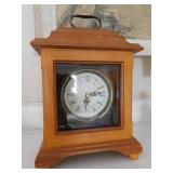 Glass front cabinet clock w/ handle, B/O