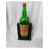 Old J&B bottle on wooden stand, 20.5"H