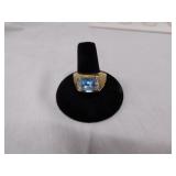 14k gold electroplate ring with lt. blue & clear