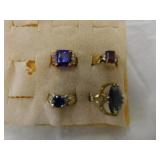 Four elegant costume rings: size 6 purple - size