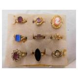 Nine goldtone costume rings