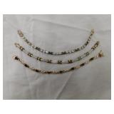 Three gold over sterling 7.5' bracelets: X and Three gold over sterling 7.5' bracelets: X and