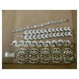 Five goldtone bracelets, all unmarked Five goldtone bracelets, all unmarked