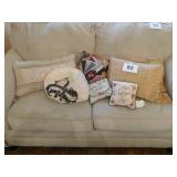 All the pillows on the loveseat: one pair and All the pillows on the loveseat: one pair and