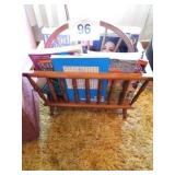 Magazine rack with puzzle books and magazines Magazine rack with puzzle books and magazines