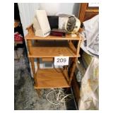 Three tiered bedside table with tiny drawer and