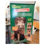 Money wrapper motorized coin bank - Uniden phone Money wrapper motorized coin bank - Uniden phone