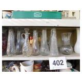 Top shelf of glass vases - 40th anniversary glass- Top shelf of glass vases - 40th anniversary glass-