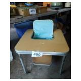 Baby's table with seat in center on wheels Baby's table with seat in center on wheels
