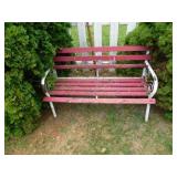 Red and white wood and metal bench