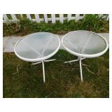 2 matching metal with glass top patio tables