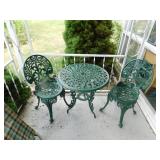 Green 3 piece cast iron patio set: 2 chairs, table Green 3 piece cast iron patio set: 2 chairs, table
