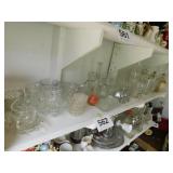 Large lot of clear glassware: some butter dishes -