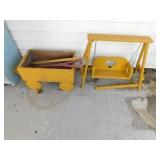 2 yellow wooden yard decor items