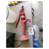 Small red metal pump, 22" high