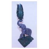 Cast iron good luck elephant candlestick,