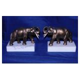 Brass elephant bookends on marble bases, 5" tall