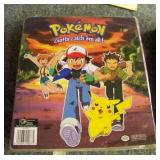 Vintage Pokï¿½mon trading cards in binder