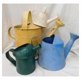 4 decorative watering cans