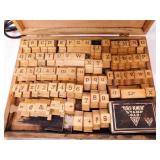 Vintage rubber stamps in wood storage box w/