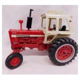 Cast toy International Harvester tractor w/