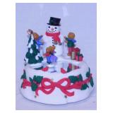Avon snowman & twirling skaters Christmas music