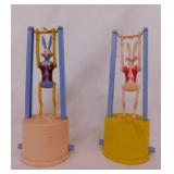2 Royal Tot Mfg. tricky trapeze toys, 7"