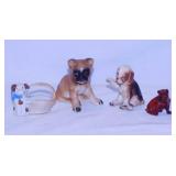 4 dog figures, tallest is 3"