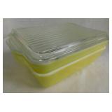 Two 1945 Pyrex Primary yellow refrigerator dishes