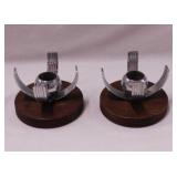 Pair of Mid Century chrome candlesticks on wood