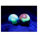 2 uranium glass shooter marbles, fluoresce
