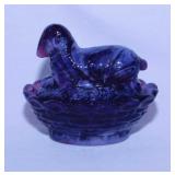Boyd amethyst slag glass lamb on nest basket,