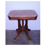 Antique carved walnut parlor table w/ pink marble