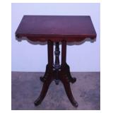 Antique carved walnut lamp table,