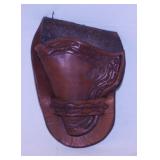 Vintage hand tooled leather pistol holster