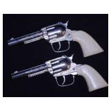 2 vintage Hubley toy cap pistol guns,
