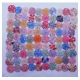 Vintage hand sewn yo-yo hot pad -